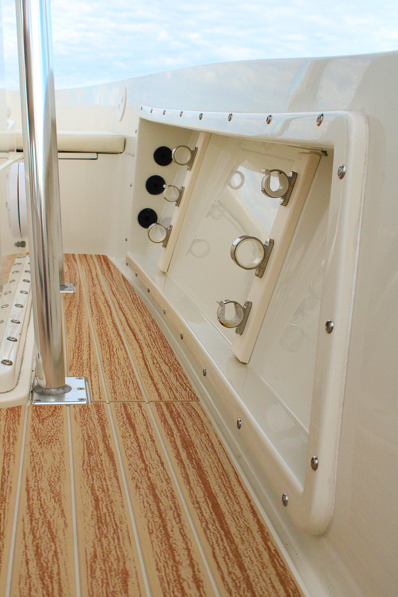 Teak-look deck and rod holders aboard the Money Makin' Mako