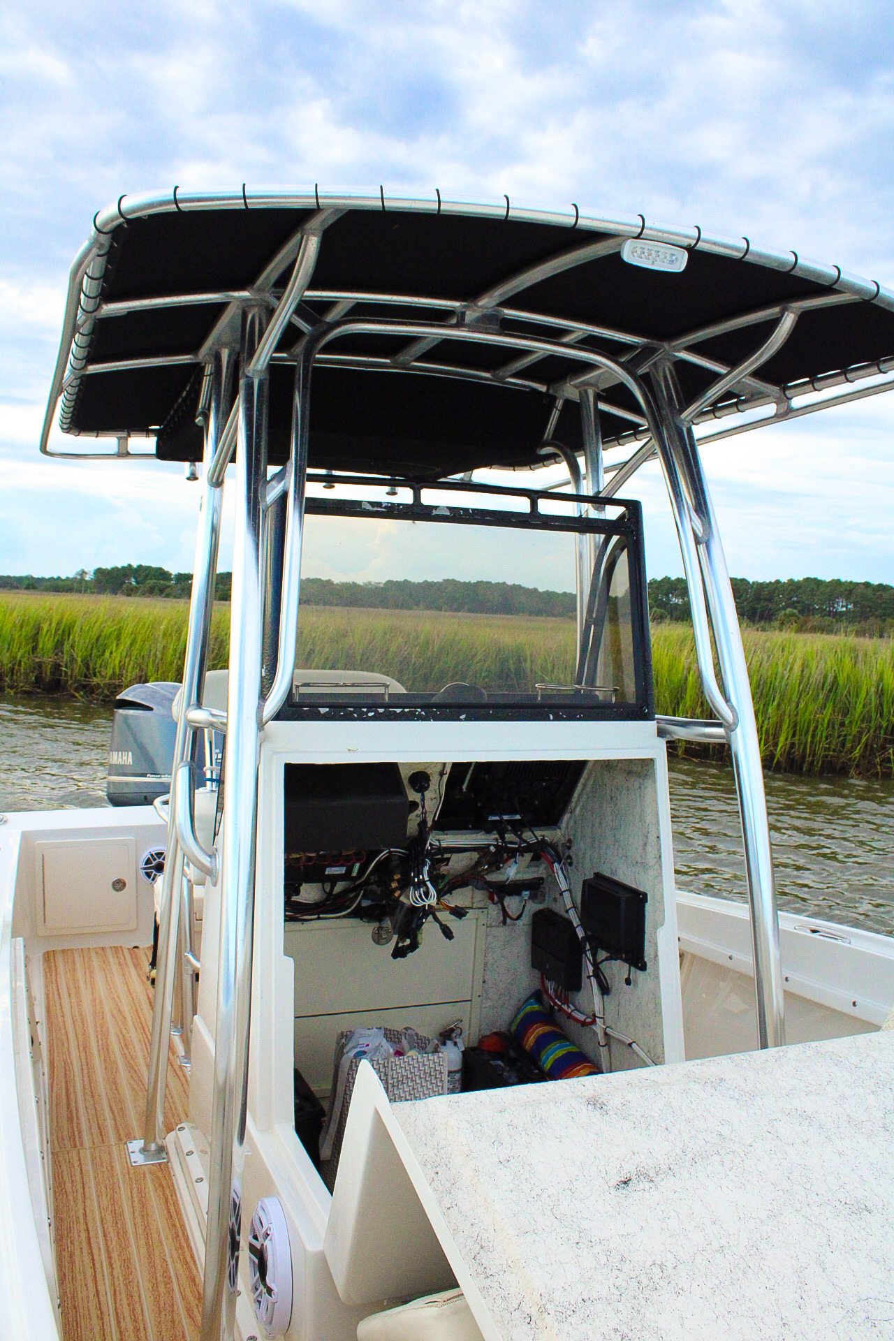 T-top and center console of the Money Makin' Mako on a tidal creek